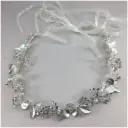 Bandita flexible plateada con flores en tonos mate