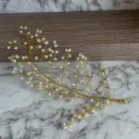 Tocado lateral plateado con perla