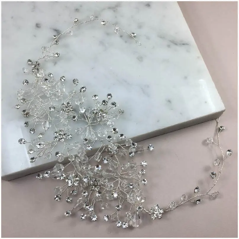 Tocado flexible con ramitas brillantes 