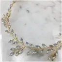 Bandita dorada con cristales transparentes (PENDIENTE)