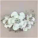 Tiara de triple flor con detalles de cristal 