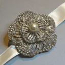 Broche vintage con centro de perla