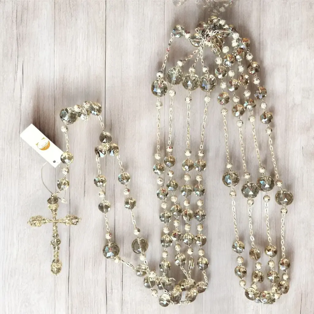 Lazo de cristal color champagne con cuentas medianas redondas